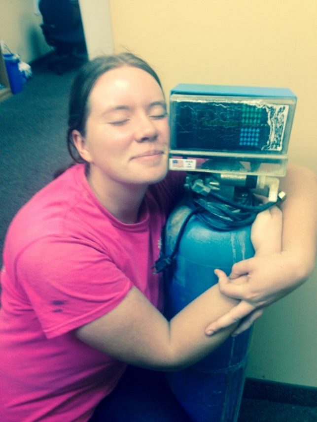 staff hugging water softener - its time to retire